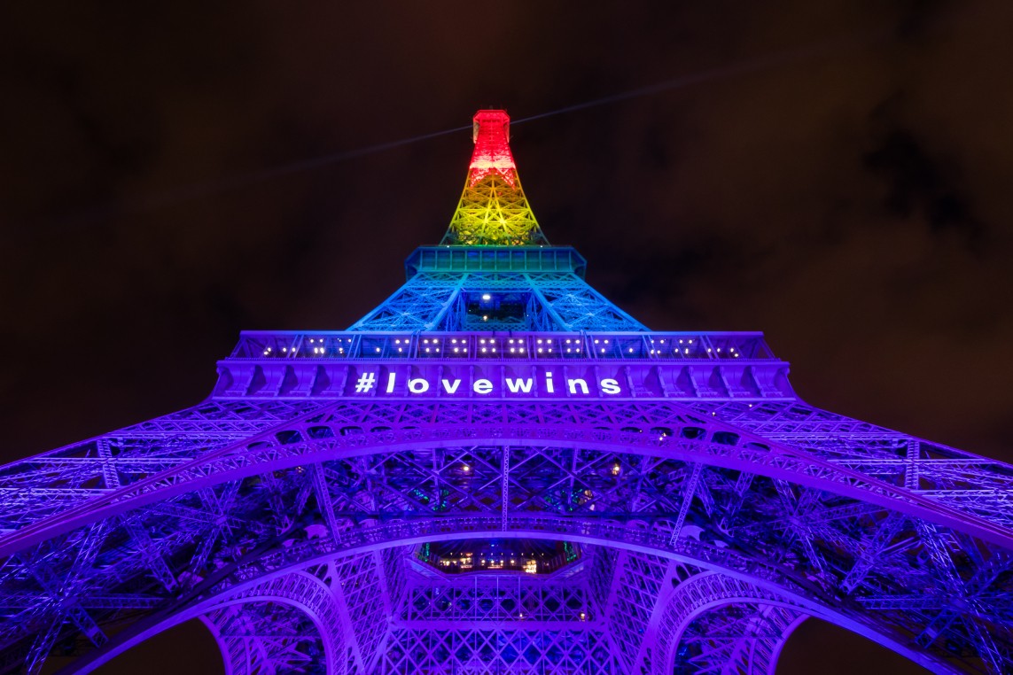 The Eiffel Tower at night rainbow